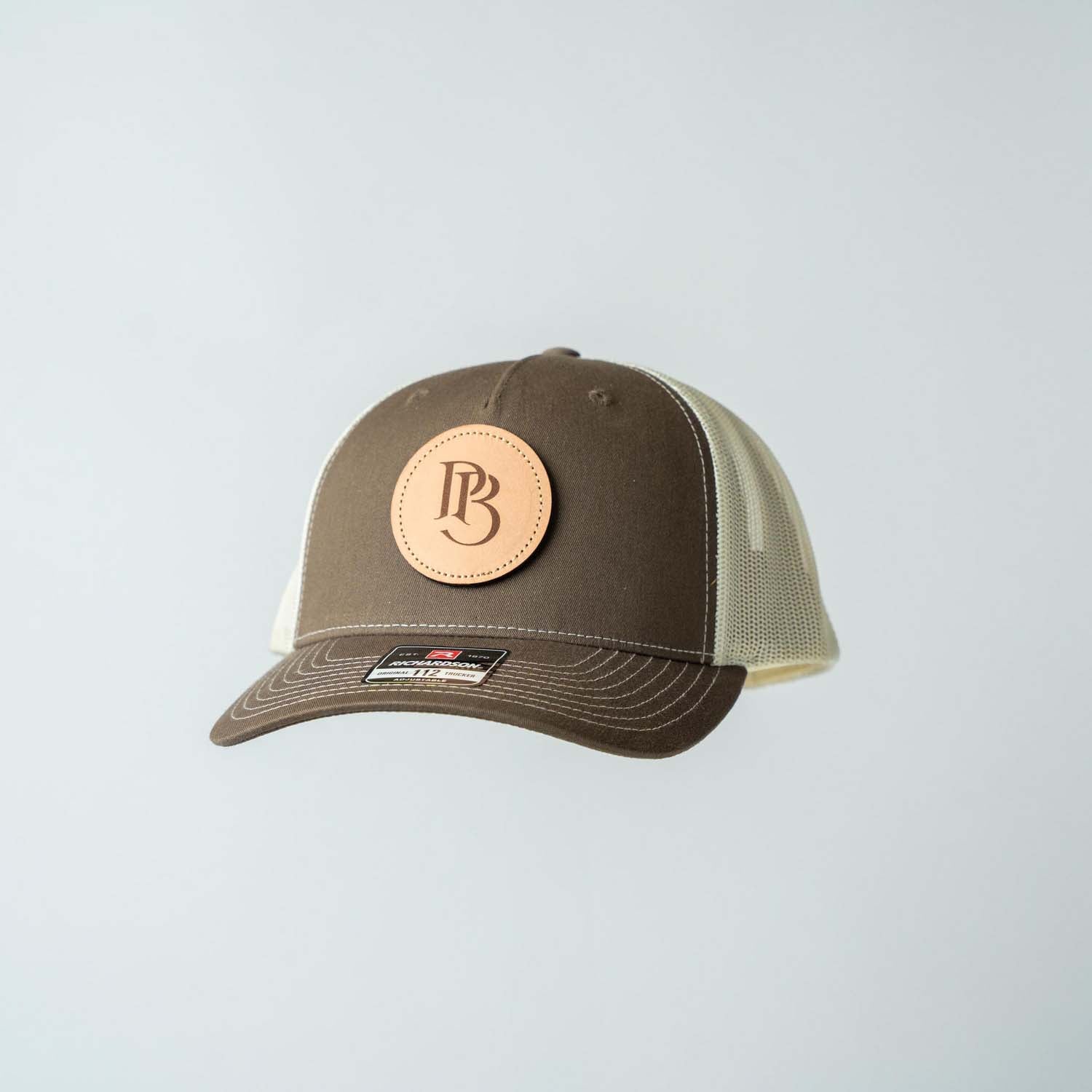 Trucker Hat | Chocolate Chip & Burch | Circular Monogram Logo Patch