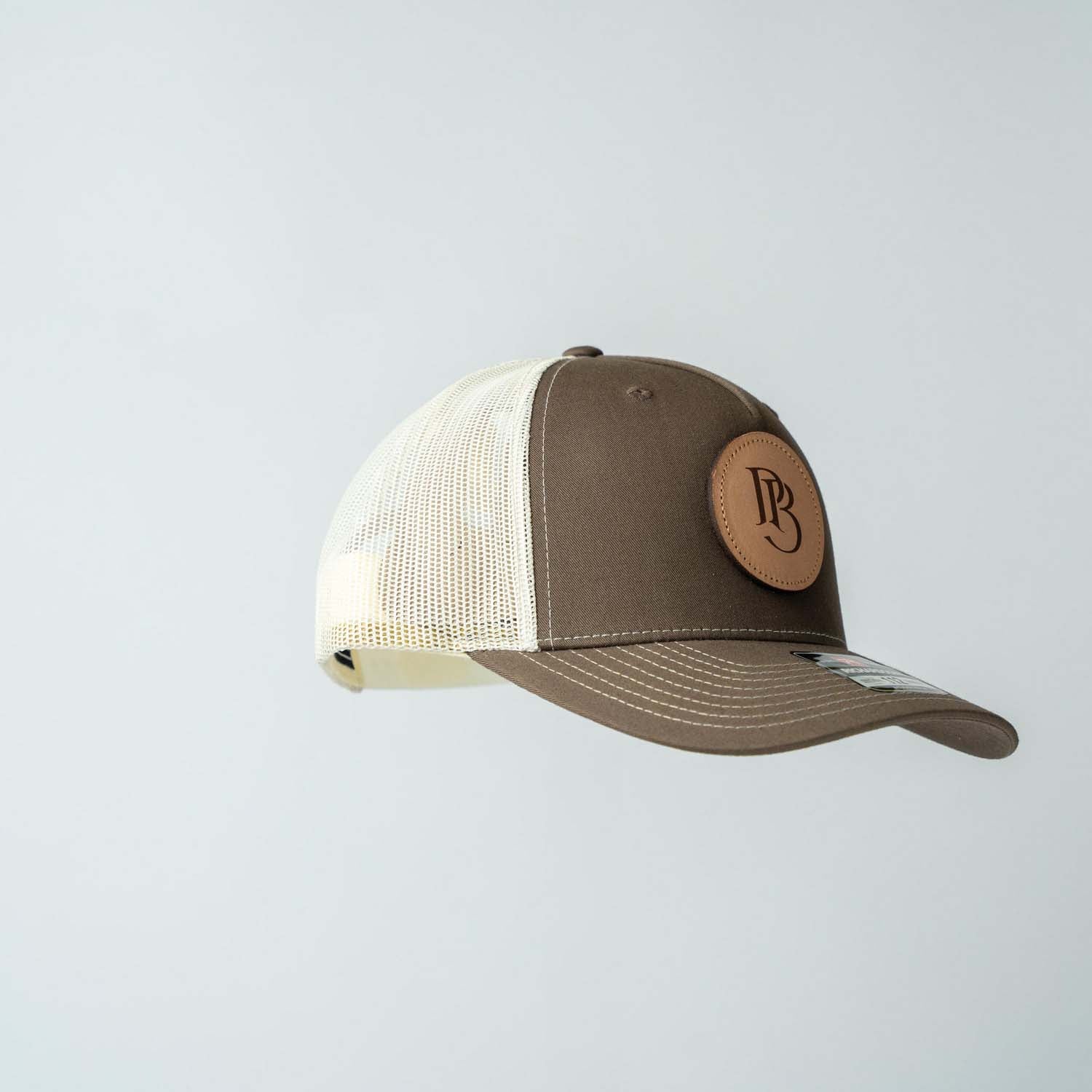 Trucker Hat | Chocolate Chip & Burch | Circular Monogram Logo Patch